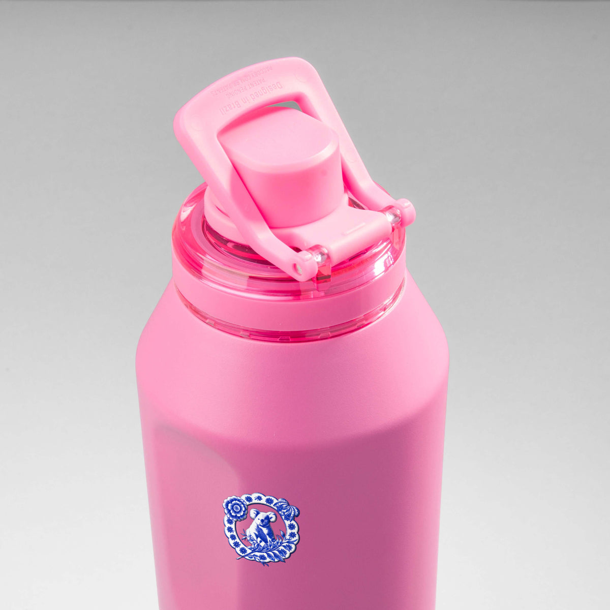 Garrafa Térmica PACCO Vyta 1200ml Porcelana de Coalas Chiclete, vista de cima com a alça levantada