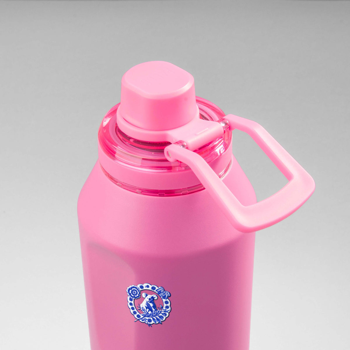 Garrafa Térmica PACCO Vyta 1200ml Porcelana de Coalas Chiclete, vista de cima com a alça de lado