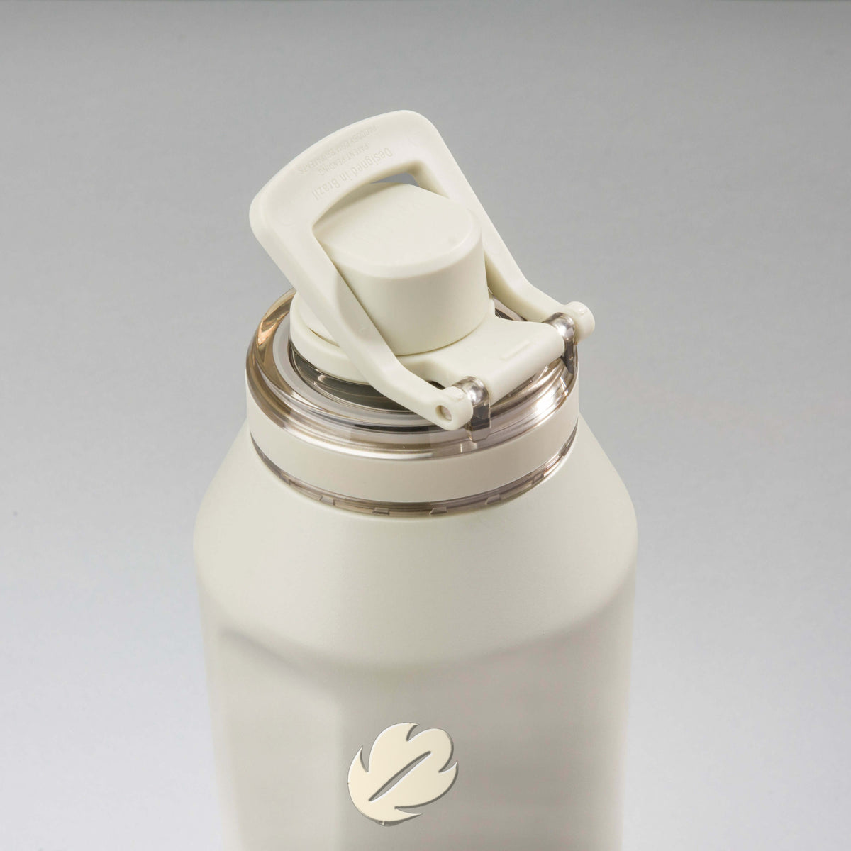 Garrafa Térmica PACCO Vyta 1200ml Folhas Creme Creme, vista de cima com a alça levantada