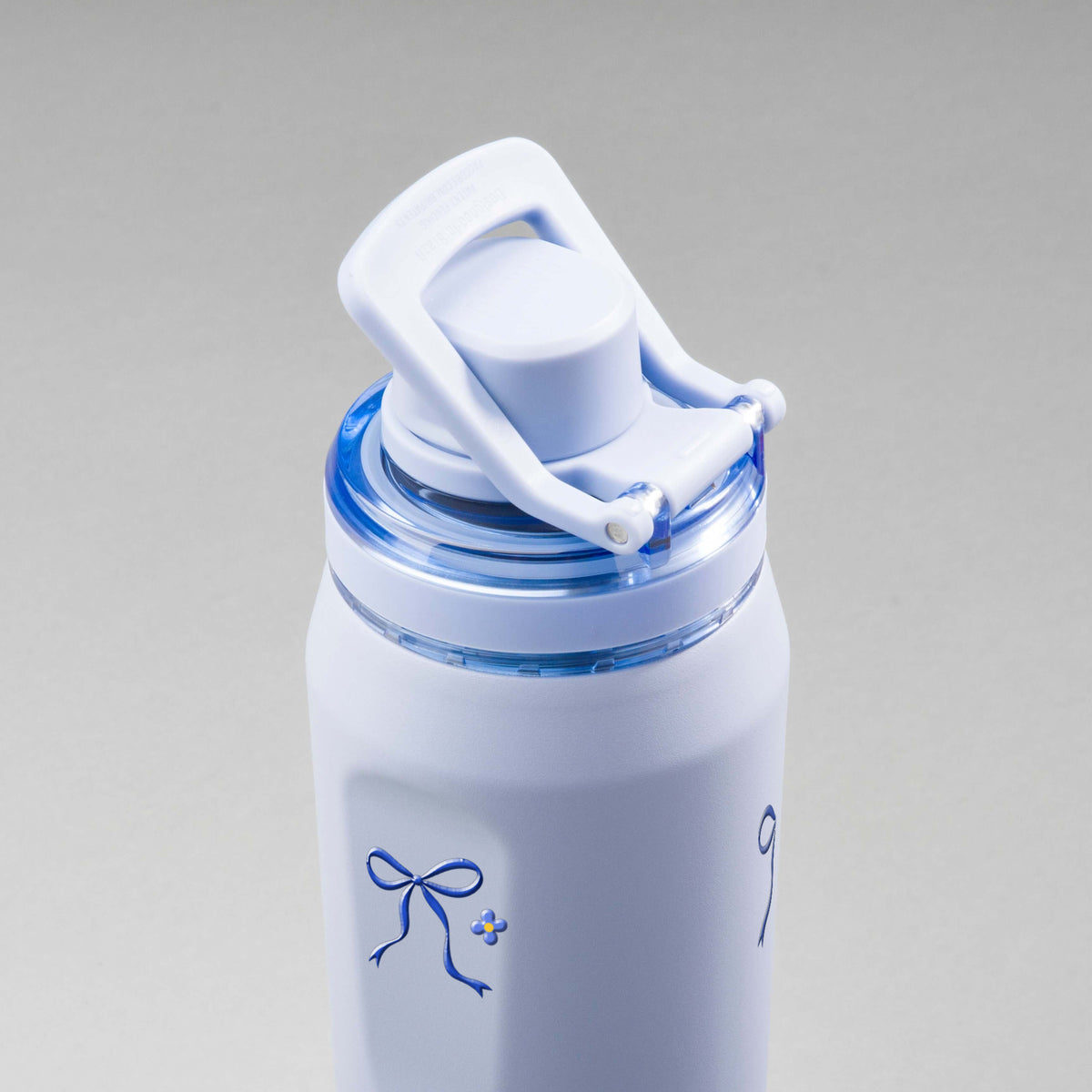 Garrafa Térmica PACCO Vyta 650ml Laço Leve Lavanda, vista de cima com a alça levantada