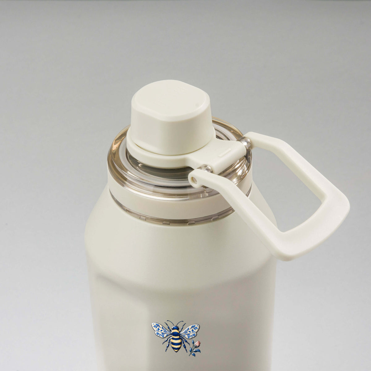 Garrafa Térmica PACCO Vyta 1200ml Porcelana Azul Creme, vista de cima com a alça de lado