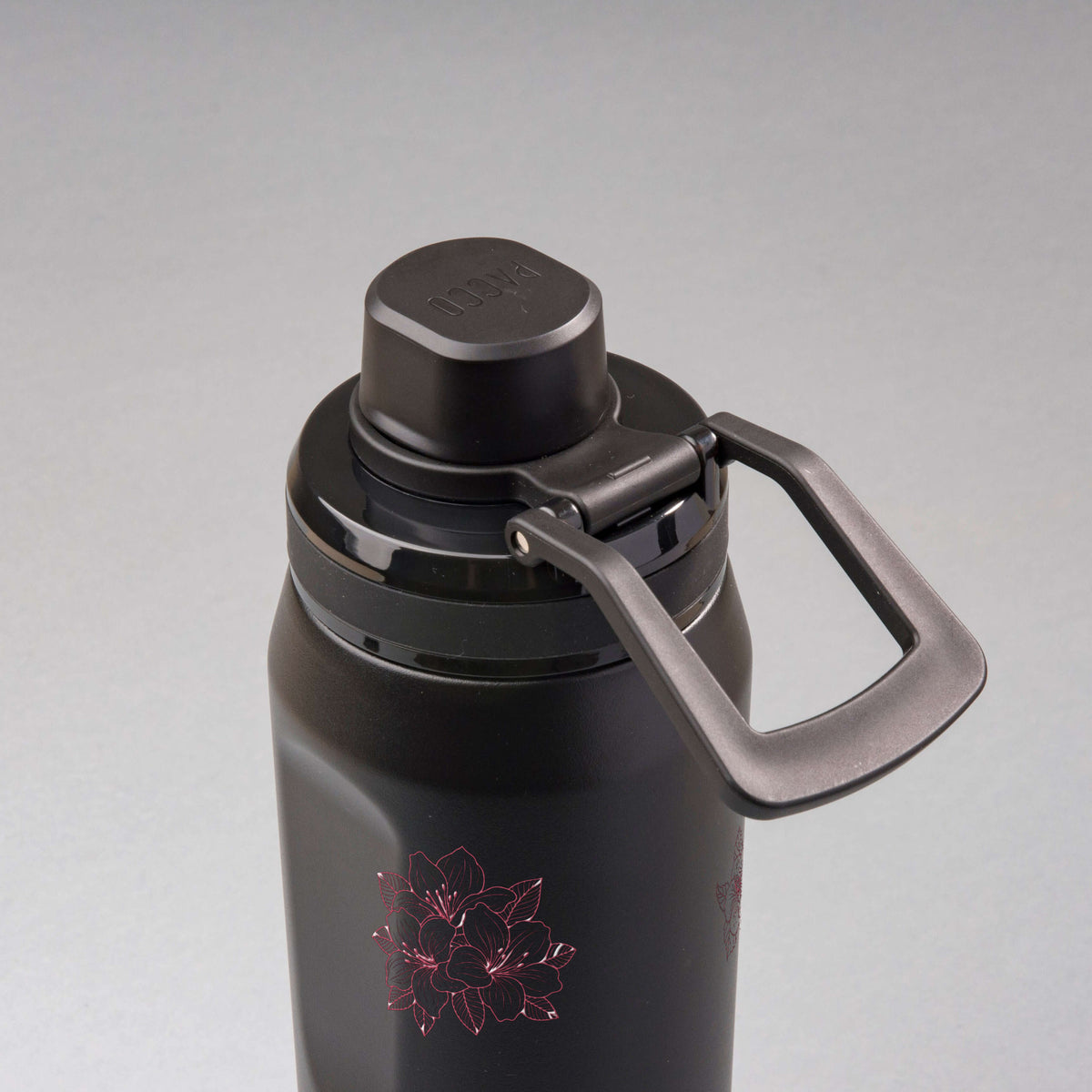 Garrafa Térmica PACCO Vyta 650ml Floral Rosa Preta, vista de cima com a alça de lado