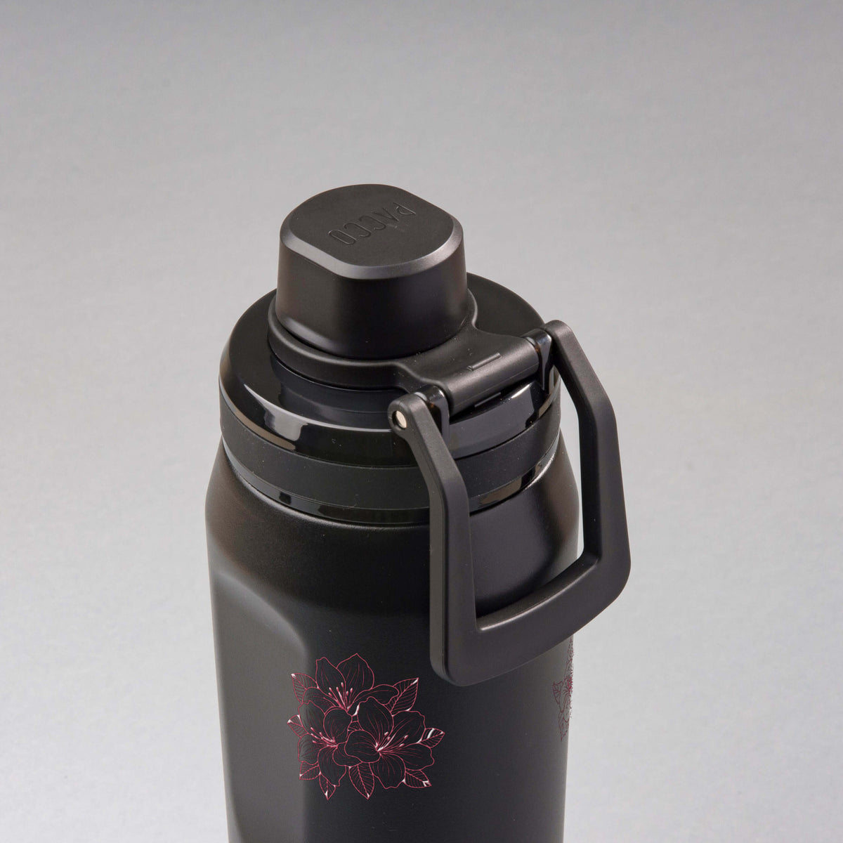 Garrafa Térmica PACCO Vyta 650ml Floral Rosa Preta, vista de cima com a alça na frente