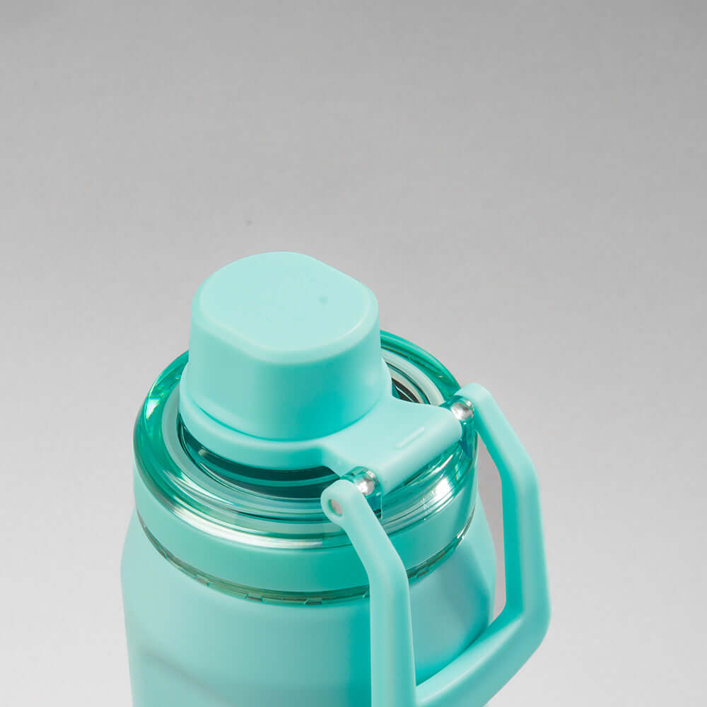 Tampa de Garrafa Térmica PACCO Vyta 650ml em aço inoxidável com design elegante e prático, cor turquesa claro.