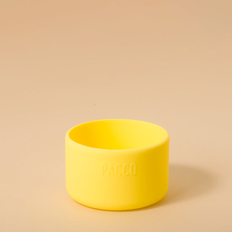 Capa de Silicone PACCO Hydra Base Grande amarela para garrafas PACCO Hydra, proteção e estilo em silicone sustentável.