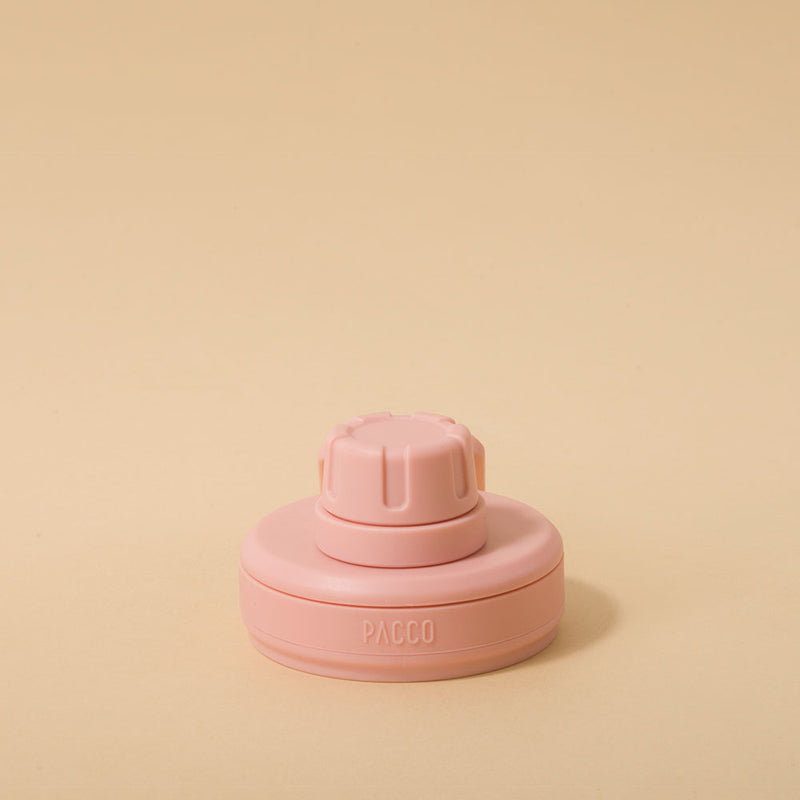 Tampa PACCO Original rosa feita em polipropileno, exibindo design arrojado para funcionalidade e conforto no transporte. Ideal para garrafas.