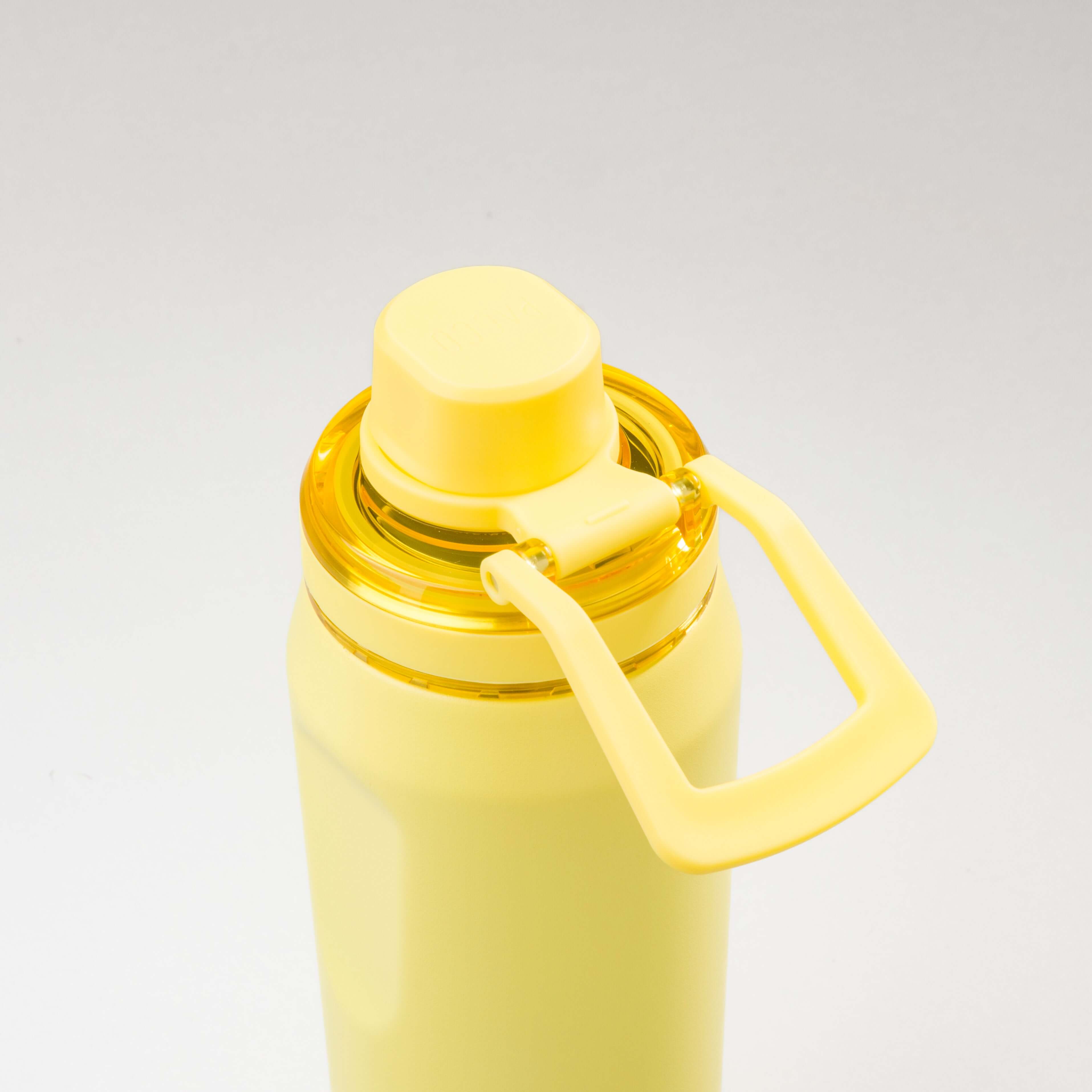 Garrafa Térmica PACCO Vyta 500ml amarela com tampa destacável de aço inoxidável 18/10, isolamento térmico avançado.