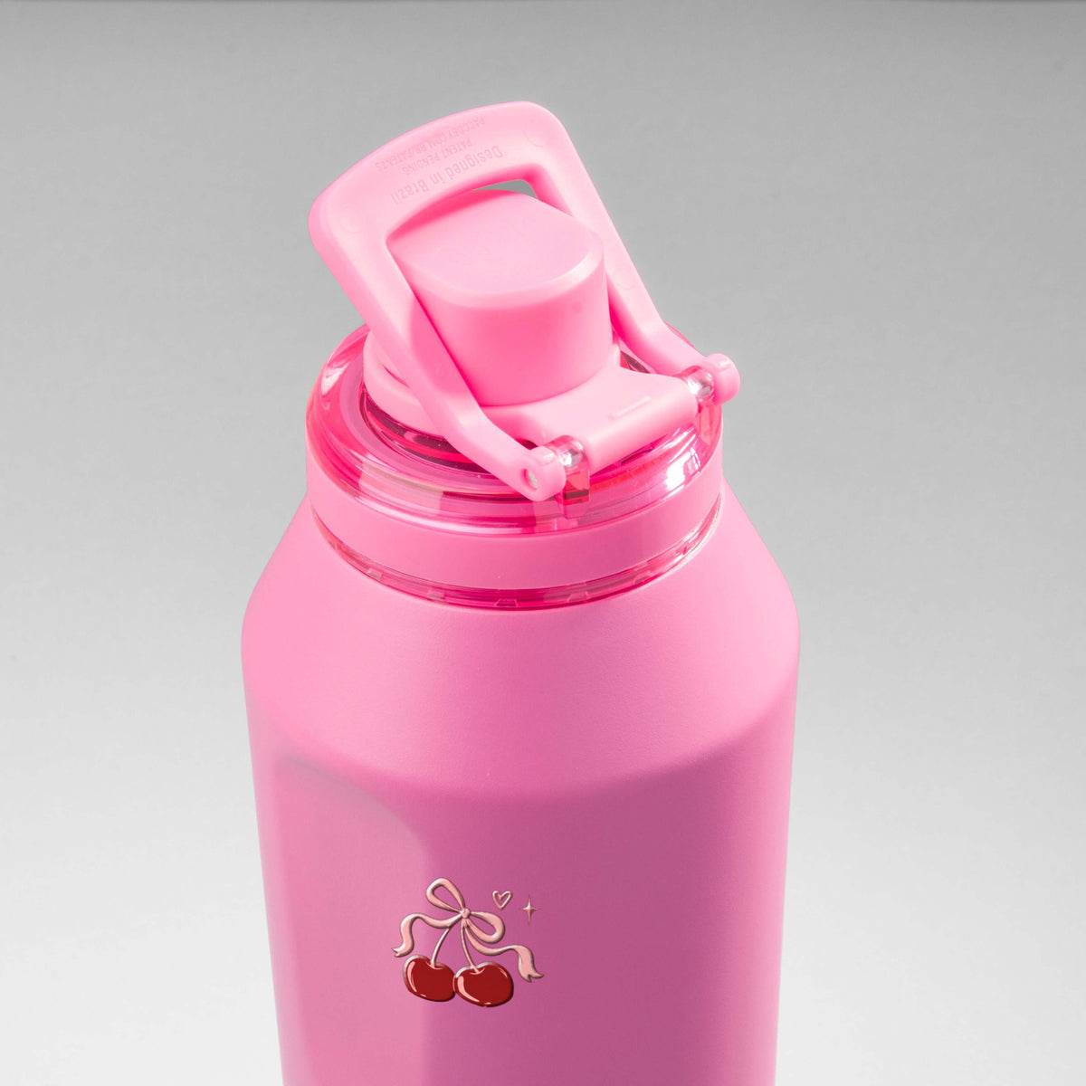 Garrafa Térmica PACCO Vyta 1200ml Cereja Pop Chiclete, vista de cima com a alça levantada