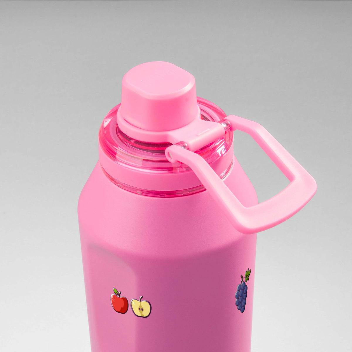 Garrafa Térmica PACCO Vyta 1200ml Frutas Chiclete, vista de cima com a alça de lado