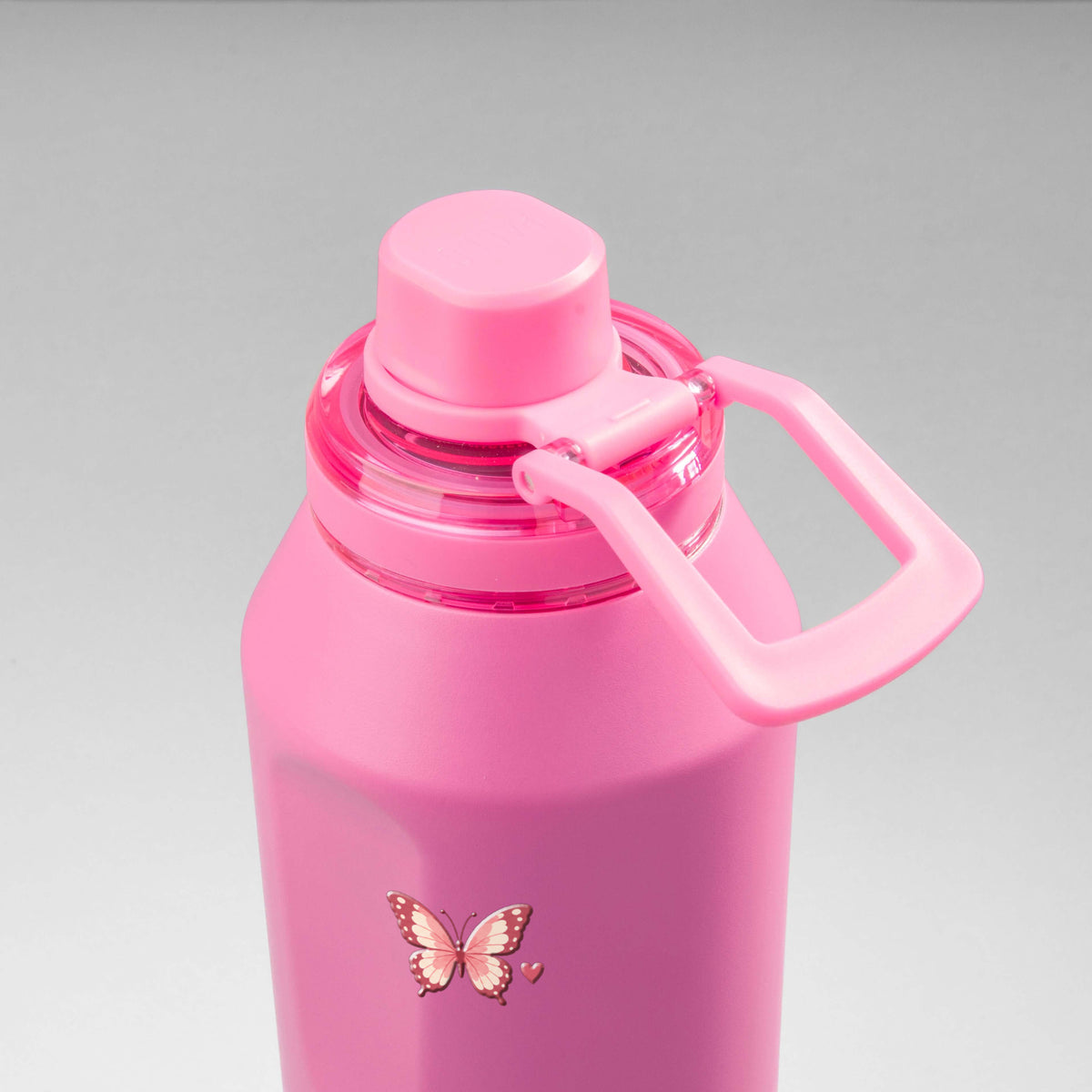 Garrafa Térmica PACCO Vyta 1200ml Rosé Butterfly Chiclete, vista de cima com a alça de lado