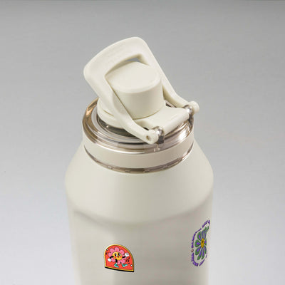 Garrafa Térmica PACCO Vyta 1200ml Retrô Good Vibes Creme, vista de cima com a alça levantada