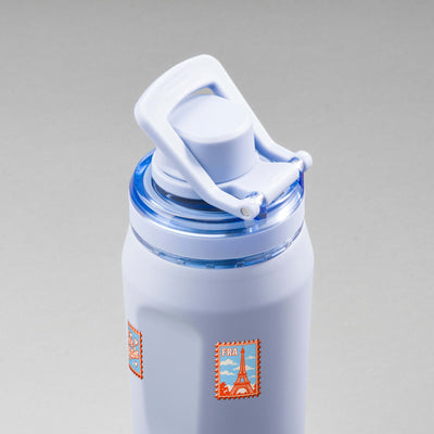 Garrafa Térmica PACCO Vyta 650ml Selos de Viagem Lavanda, vista de cima com a alça levantada