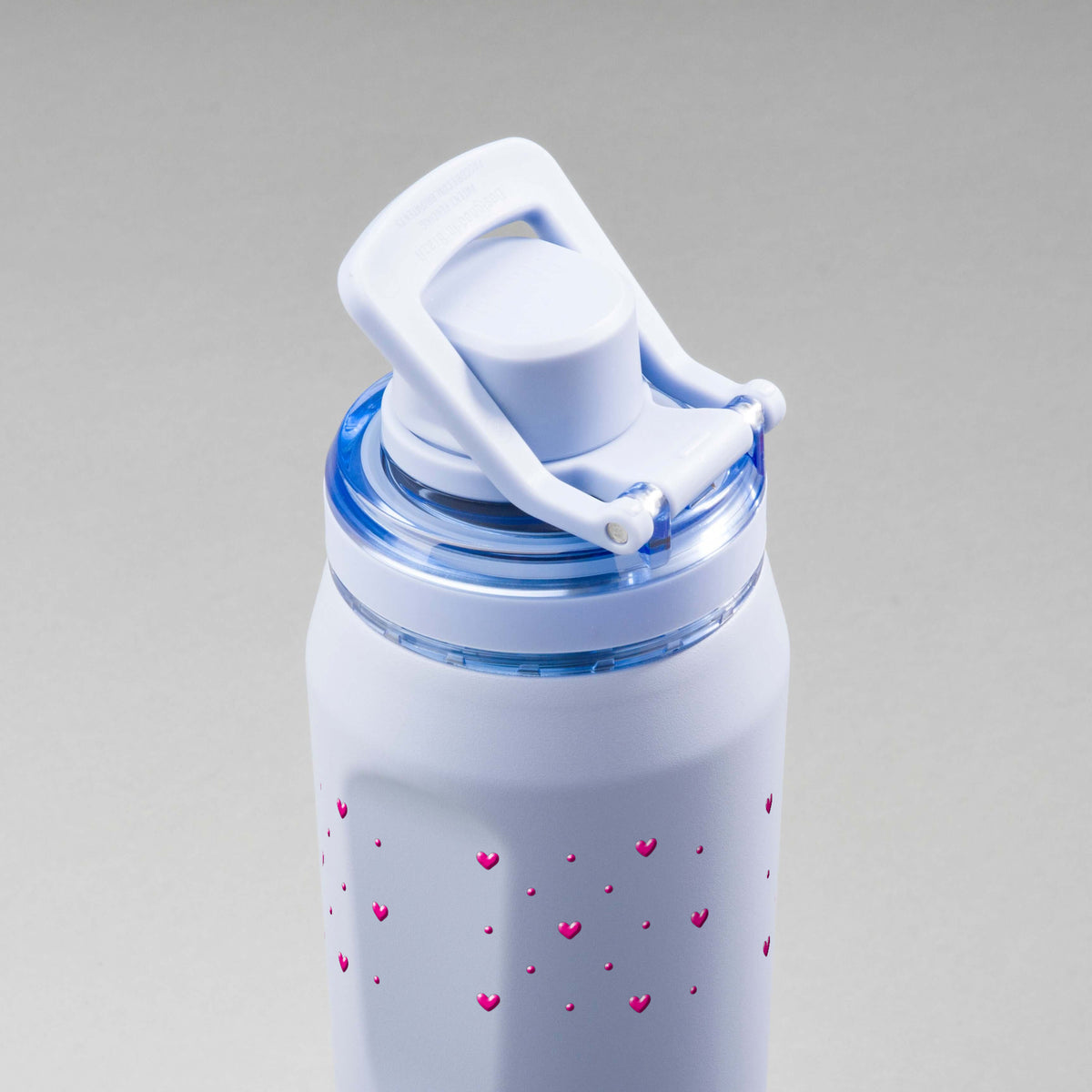 Garrafa Térmica PACCO Vyta 650ml Corações Rosa Lavanda, vista de cima com a alça levantada