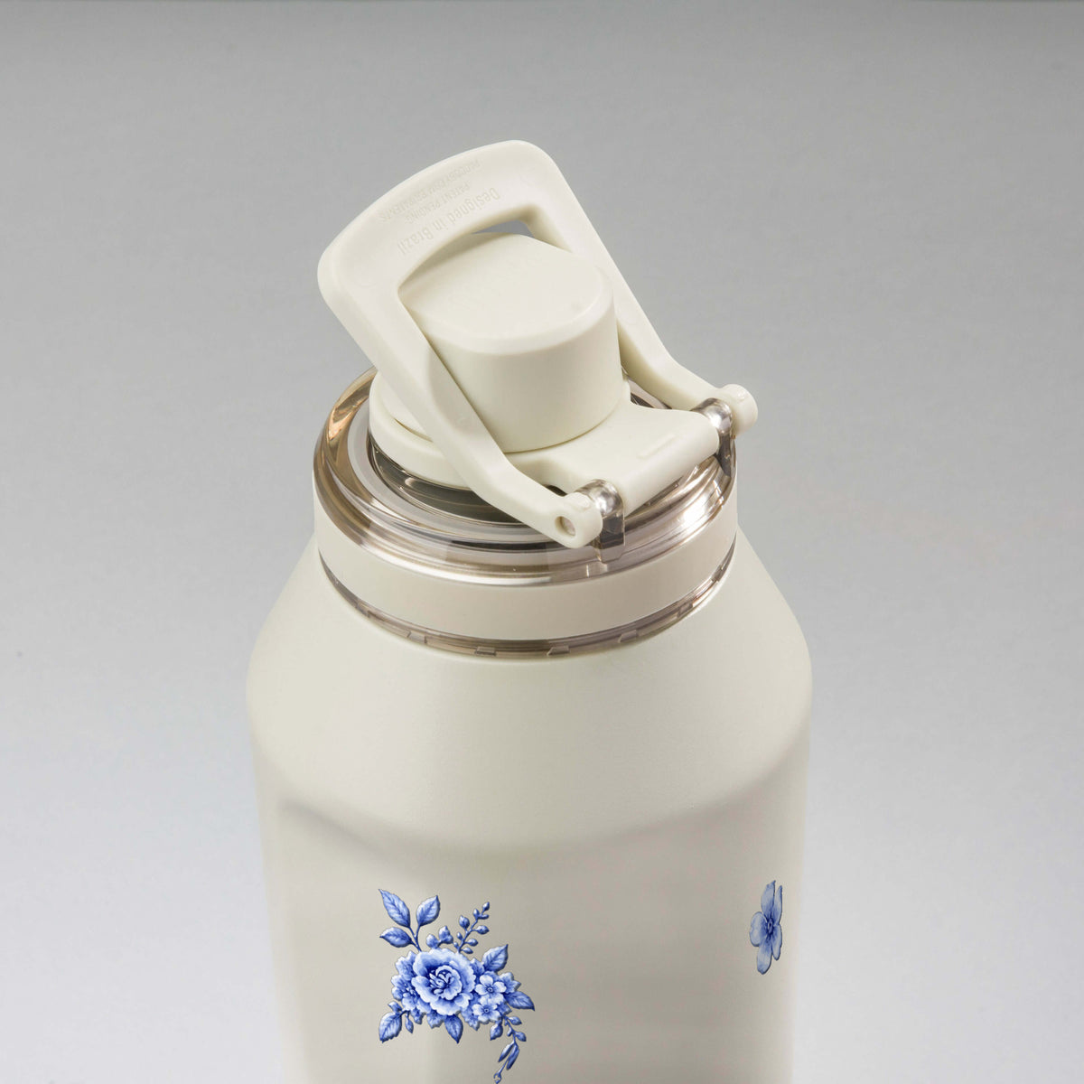 Garrafa Térmica PACCO Vyta 1200ml Jardim Azul Creme, vista de cima com a alça levantada