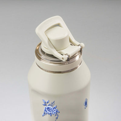Garrafa Térmica PACCO Vyta 1200ml Jardim Azul Creme, vista de cima com a alça levantada