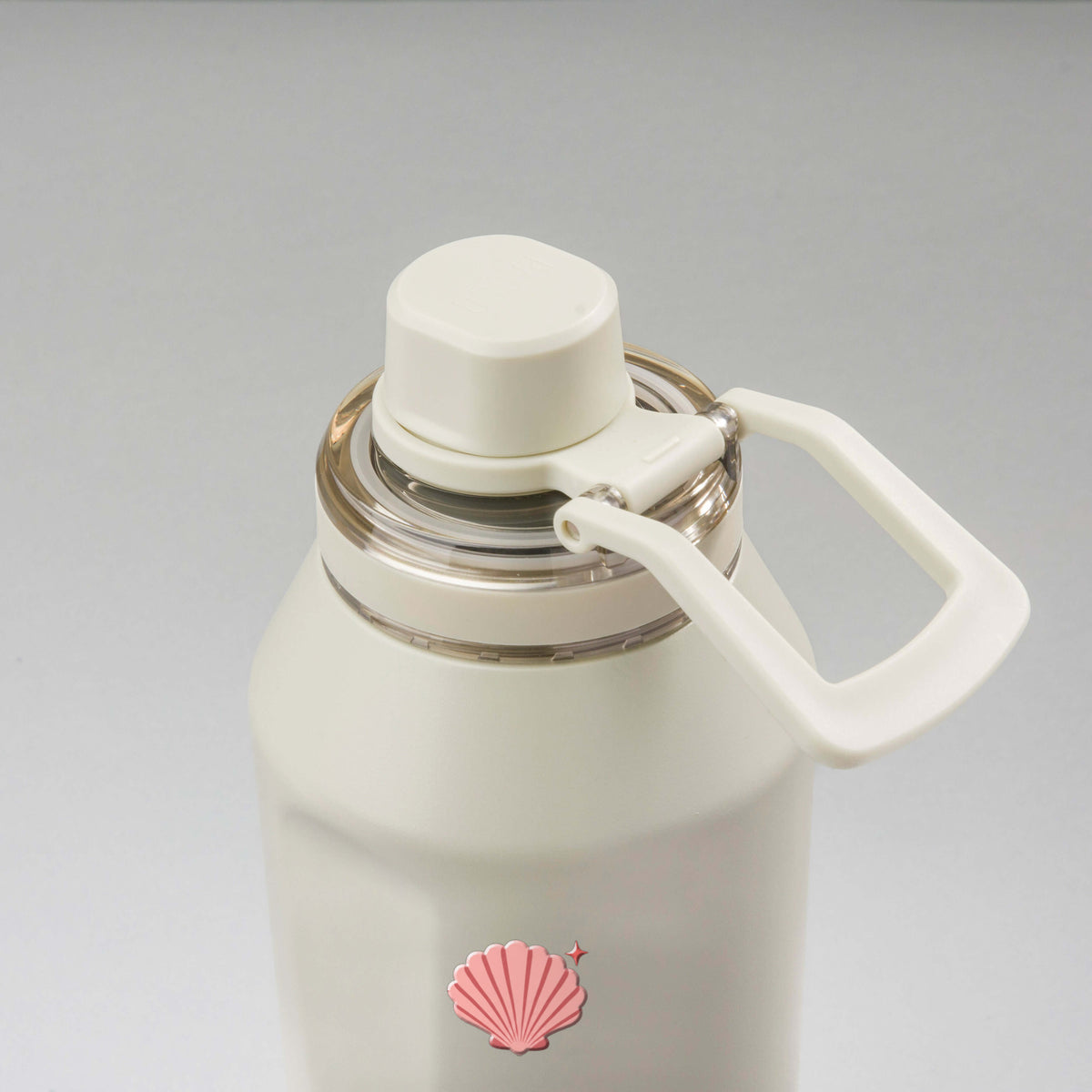 Garrafa Térmica PACCO Vyta 1200ml Ocean Blush Creme, vista de cima com a alça de lado