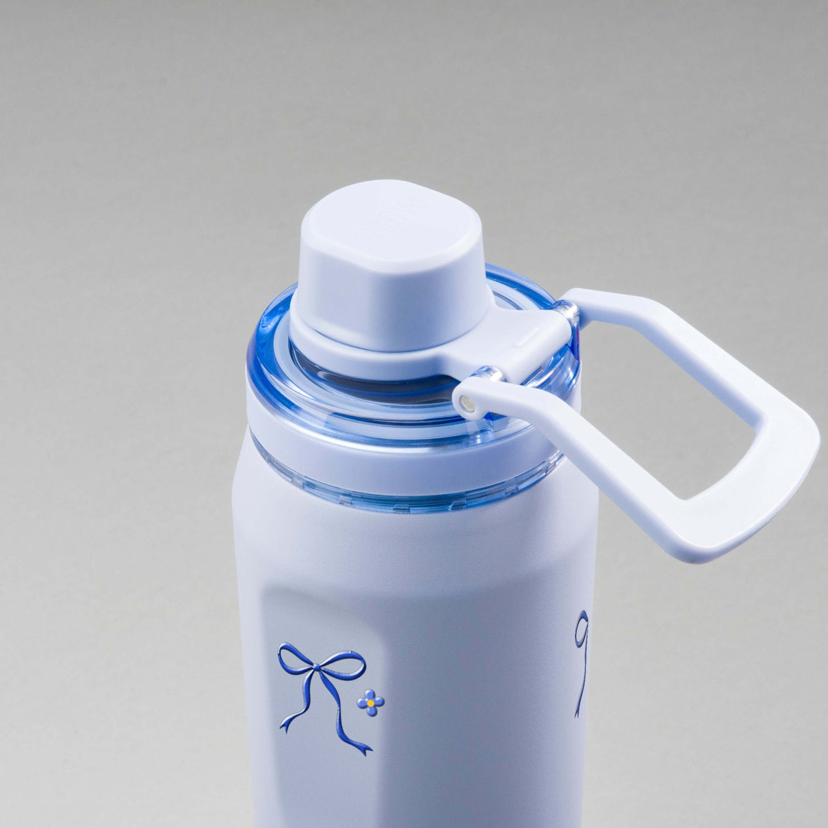 Garrafa Térmica PACCO Vyta 650ml Laço Leve Lavanda, vista de cima com a alça de lado