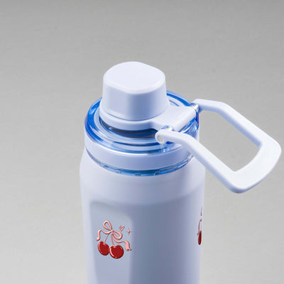 Garrafa Térmica PACCO Vyta 650ml Cereja Pop Lavanda, vista de cima com a alça de lado