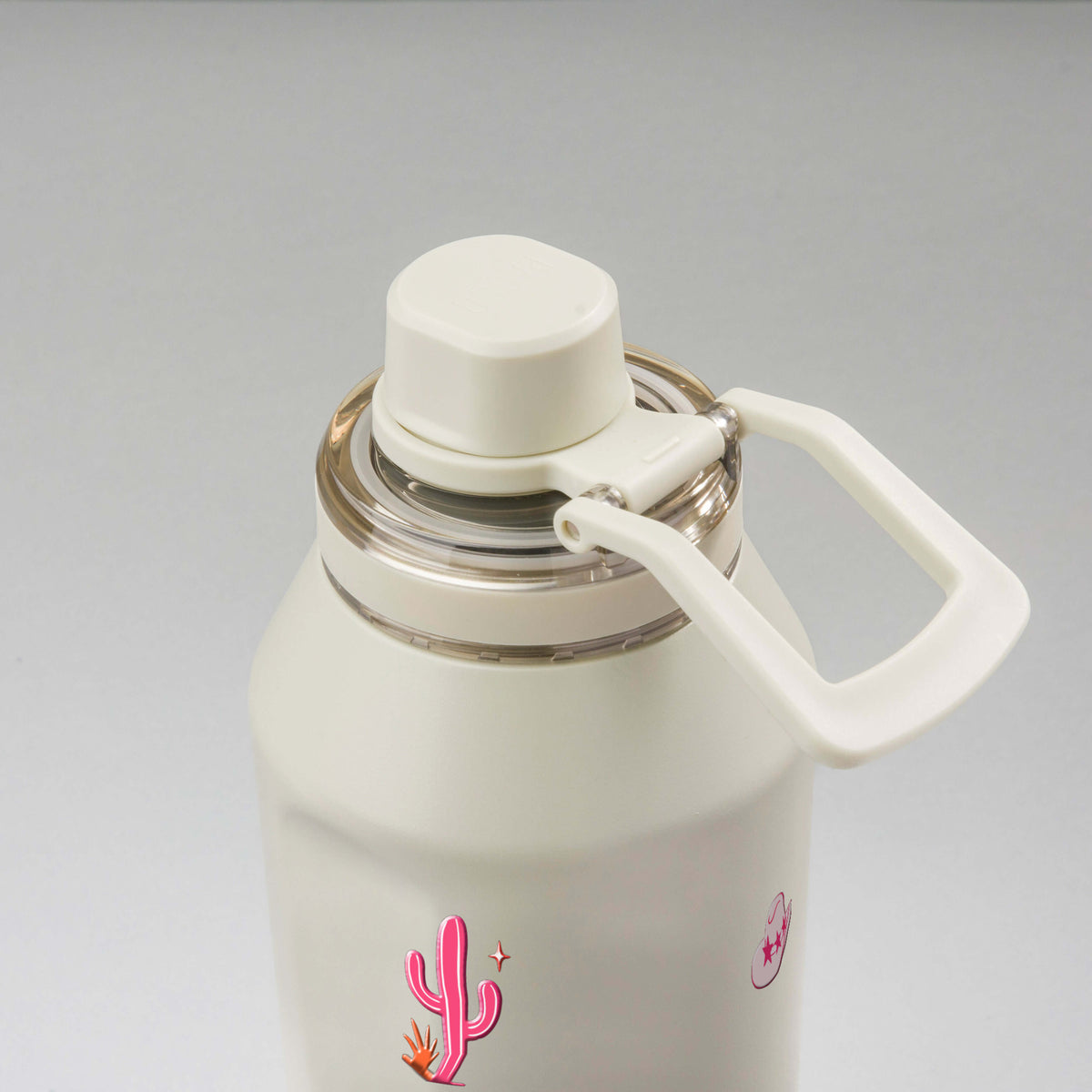 Garrafa Térmica PACCO Vyta 1200ml Country Rosa Creme, vista de cima com a alça de lado