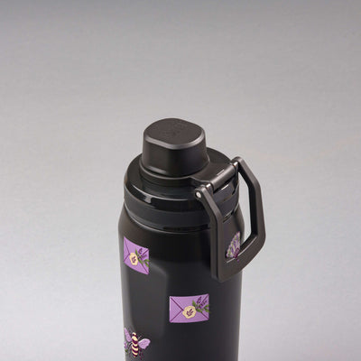 Garrafa Térmica PACCO Vyta 500ml Lavanda Botânica Preta, vista de cima com a alça na frente