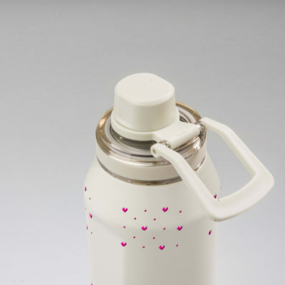 Garrafa Térmica PACCO Vyta 950ml Corações Rosa Creme, vista de cima com a alça de lado