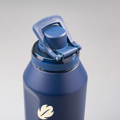 Garrafa Térmica PACCO Vyta 1200ml Folhas Creme Marinho, vista de cima com a alça levantada
