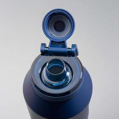 Garrafa Térmica PACCO Vyta 1200ml, tecnologia térmica avançada, aço inox 18/10, mantém bebidas frias ou quentes, tampa aberta.