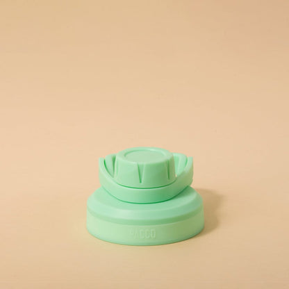 Tampa PACCO Stiff verde clara, vedação hermética e funcionalidade máxima, ideal para transporte seguro de garrafas sem vazamentos.