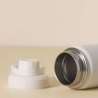 Garrafa Térmica PACCO Hydrav2 350ml aberta exibindo construção de aço inoxidável e tampa, destacando design e funcionalidade.