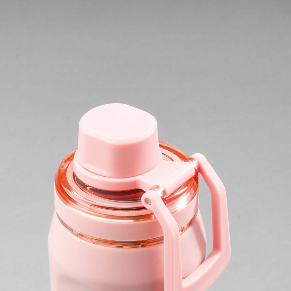 Garrafa Térmica PACCO Vyta 500ml em rosa com tampa robusta e alça, destacando resistência e design sofisticado.