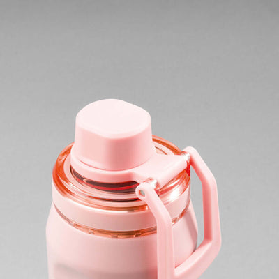 Garrafa Térmica PACCO Vyta 500ml em rosa com tampa robusta e alça, destacando resistência e design sofisticado.