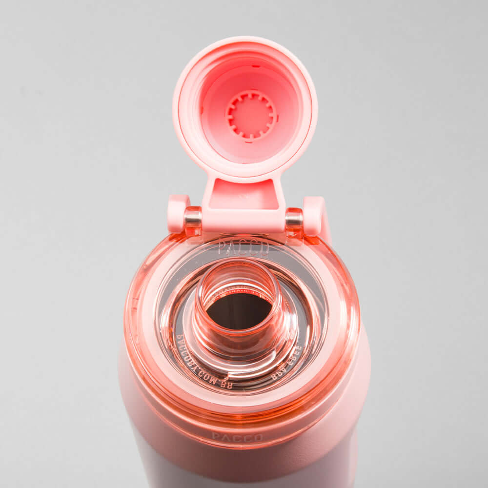 Tampa aberta da Garrafa Térmica PACCO Vyta 500ml rosa mostrando o interior em aço inox, destacando elegância e tecnologia térmica.