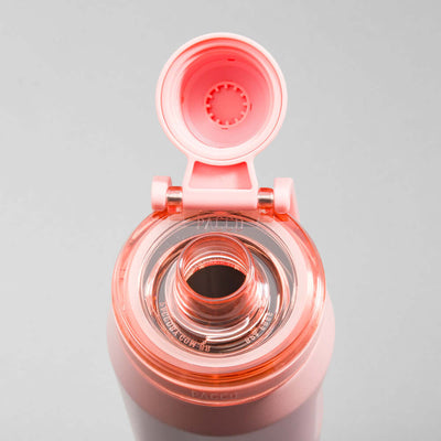 Tampa aberta da Garrafa Térmica PACCO Vyta 500ml rosa mostrando o interior em aço inox, destacando elegância e tecnologia térmica.