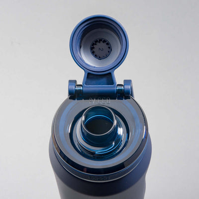 Garrafa Térmica PACCO Vyta 650ml com tampa aberta, mostrando o design de aço inox durável e elegante para conservação térmica.