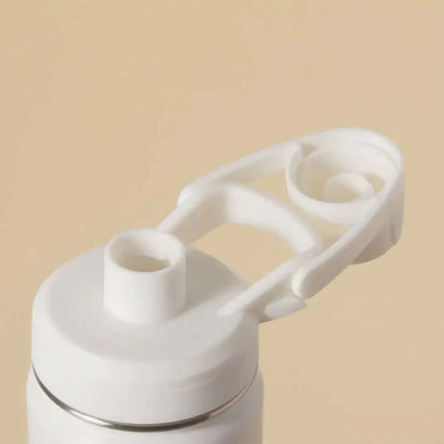 Tampa da Garrafa Térmica PACCO Hydrav2 650ml com design ergonômico em fundo bege