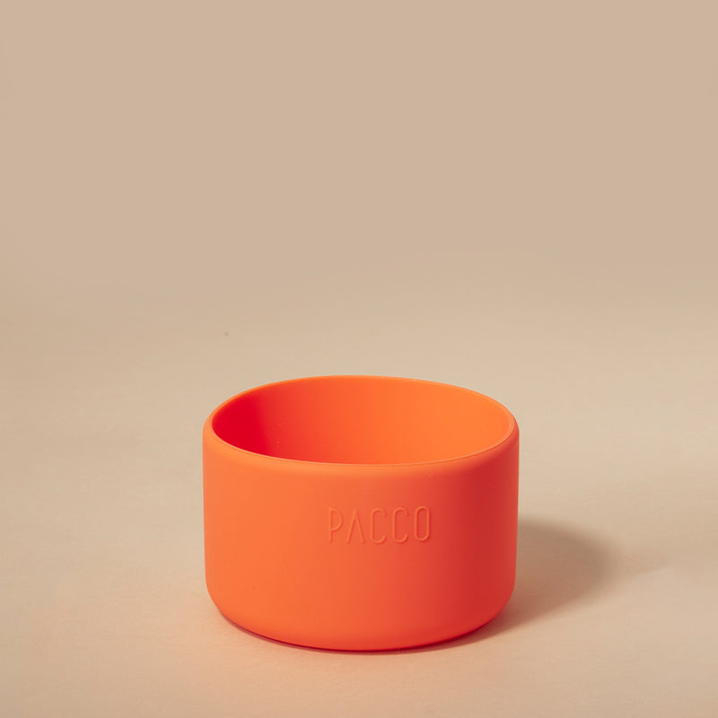 Capa de Silicone PACCO Hydra Base Grande laranja para proteção de garrafas PACCO, oferecendo segurança e estilo.