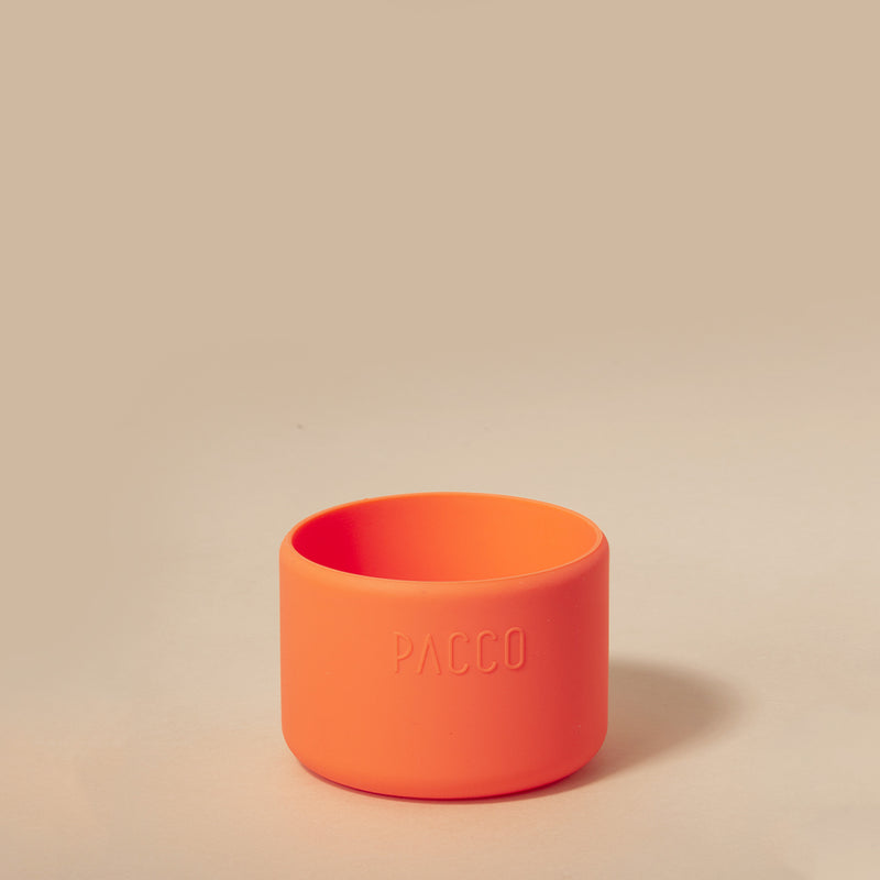 Capa de Silicone PACCO Hydra Base PEQUENO laranja para garrafas Hydra V2 ou V3, oferecendo proteção, estilo e conforto.