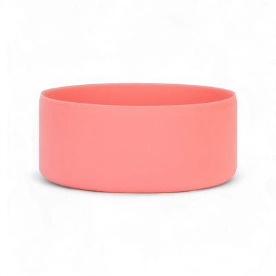 Protetor de Silicone G - by empório, base antirrisco para garrafas grandes, em silicone flexível e resistente, de cor rosa.