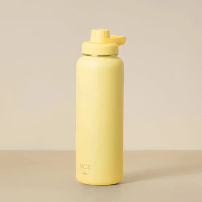 Garrafa Térmica PACCO Hydrav2 1200ml amarela, design durável, mantém bebidas quentes por 12h e frias por 24h, ideal para viagens e academia.
