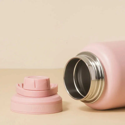Garrafa Térmica PACCO Hydrav2 1200ml rosa com tampa, destacando design elegante e durabilidade, ideal para bebidas frias ou quentes.