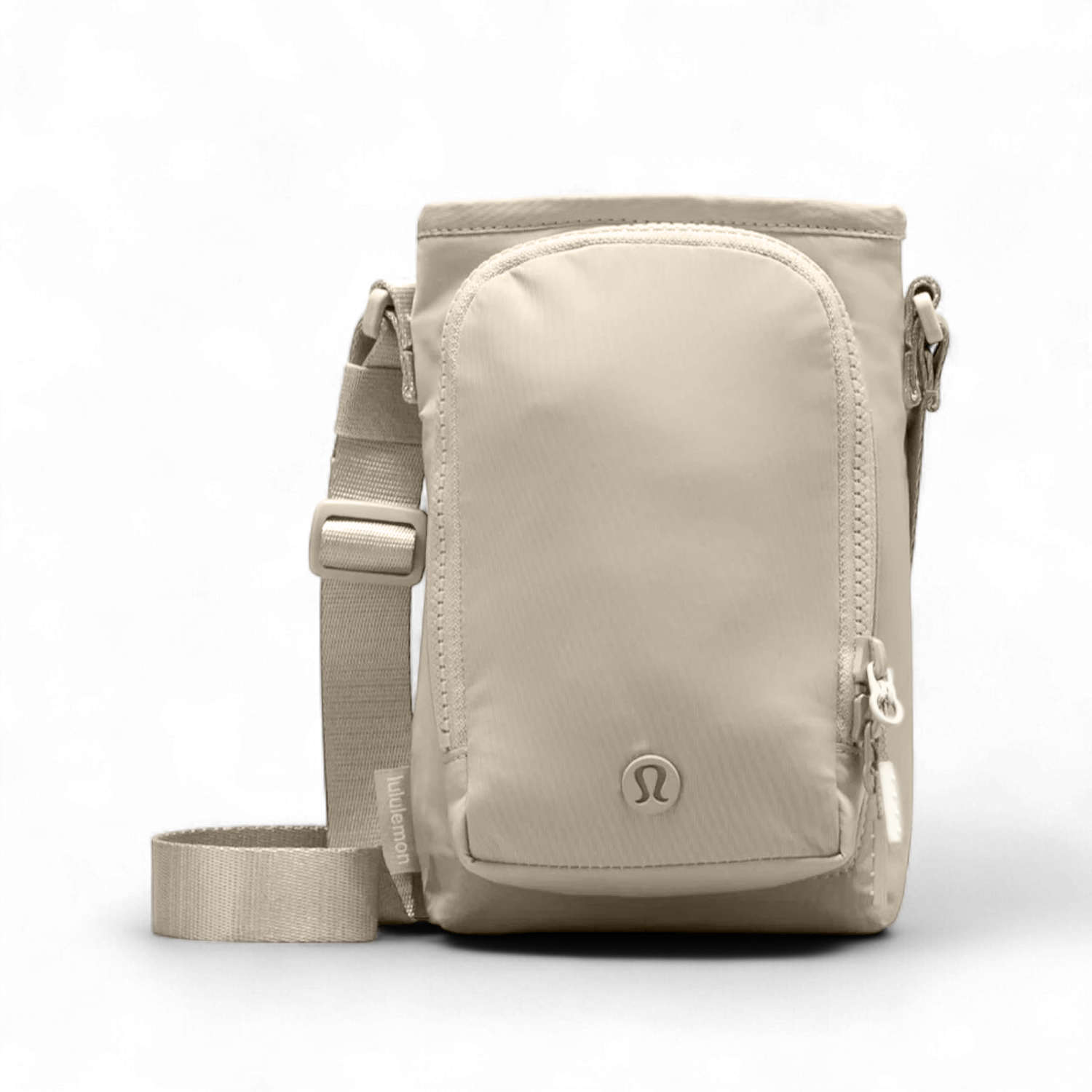 Bolsa para Garrafa Térmica - Cross Bottle Lululemon em cor neutra com alça ajustável, ideal para transporte prático e mãos livres.