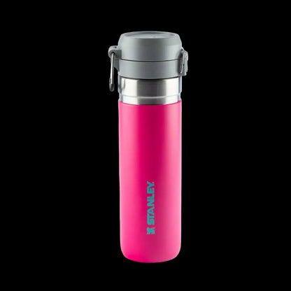 Garrafa Térmica Quick Flip Stanley - 710ml rosa com tampa cinza, destacando isolamento a vácuo e design portátil.