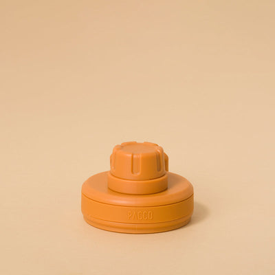 Tampa PACCO Original laranja com design arrojado e funcionalidade excepcional, ideal para garrafas, oferece praticidade e segurança.