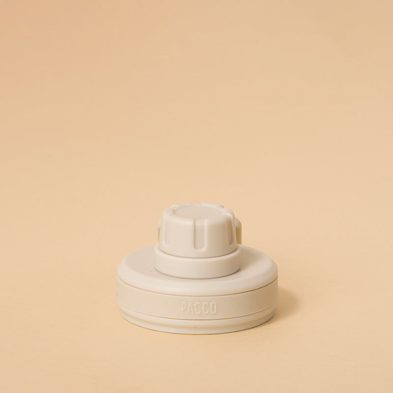 Tampa PACCO Original, design arrojado em polipropileno, leve e durável, com alça para transporte seguro de garrafas PACCO.