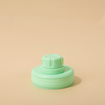 Tampa PACCO Original verde em polipropileno, destacando design moderno e funcionalidade para transporte seguro de garrafas.