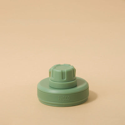 Tampa PACCO Original verde com design moderno e alça de transporte, feita de polipropileno premium para uso diário.