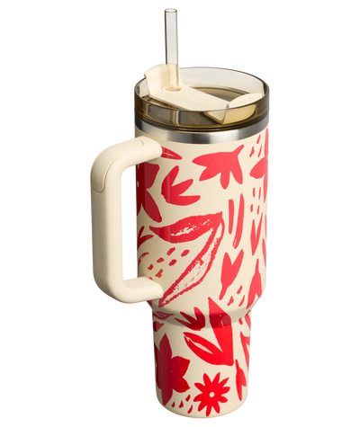 Copo Quencher Stanley 1,18L em design floral colorido com alça e canudo, ideal para estilo e hidratação eficaz.