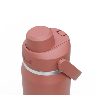 Garrafa Térmica Camelbak Thrive 740ml em tom rosa, destacando o bico e botão de fechamento.