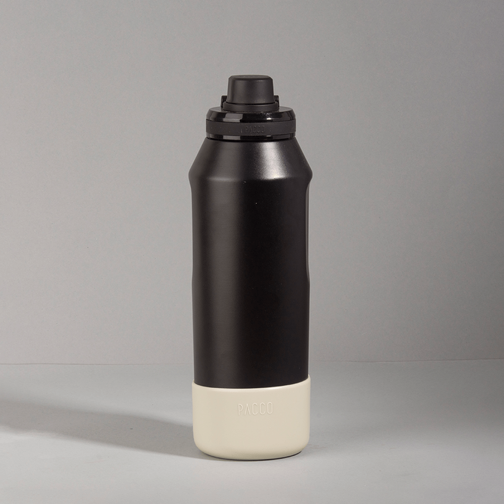 Capa Vyta PACCO 1200ml elegante em silicone ecológico para proteção de garrafa.