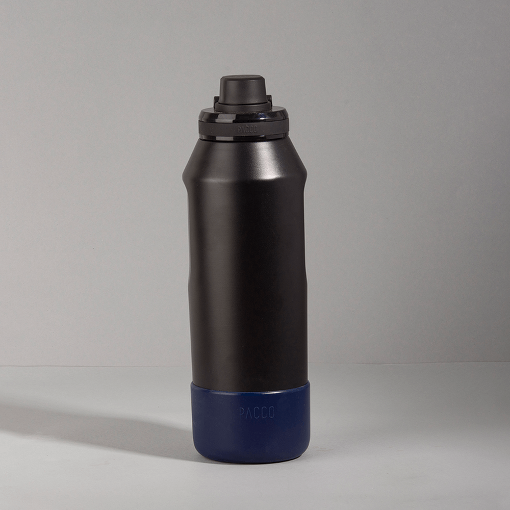Capa Vyta PACCO 1200ml: capa protetora em silicone ecológico para garrafas, durabilidade e elegância.